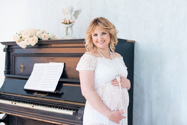Беременная пианистка